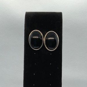 Black statement earrings